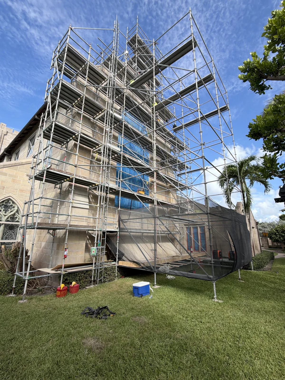 The Church of Bethesda-by-the-Sea in Palm Beach, Florida under full scaffolding for stone restoration.