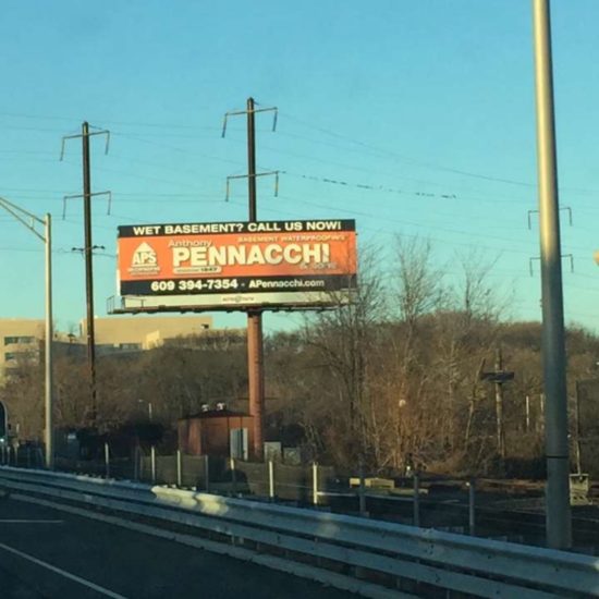 Highway billboard for A. Pennachi & Sons, Co. Wet Basement? Call us now!