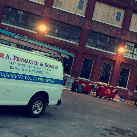 Work Van from A. Pennachi & Sons, Co. onsite at a buildin restoration project in New Jersey.
