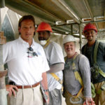 Paul Pennacchi and staff during a building restoration project.