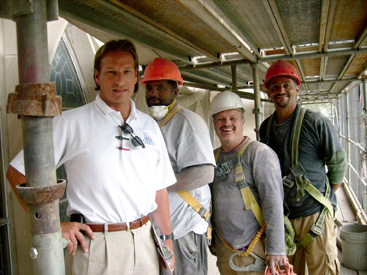 Paul Pennacchi and staff during a building restoration project.