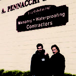 Paul Pennachi in front of A. Pennachi & Sons, Co. building. Masonry, waterproofing contractors. Established in 1947.